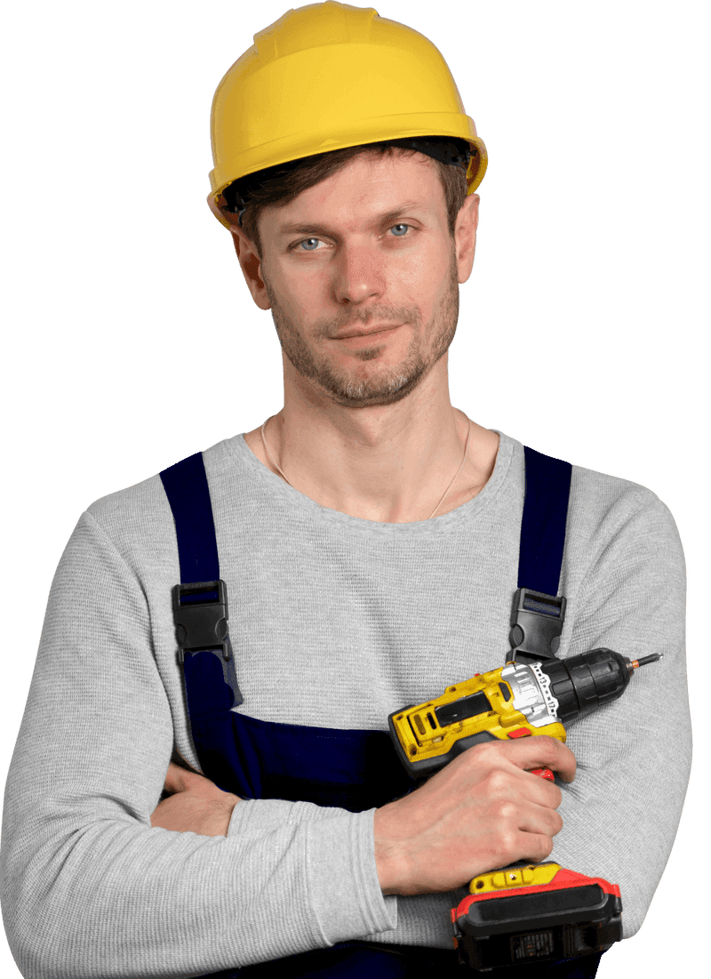 A Drainman plumber holding a cordless drill